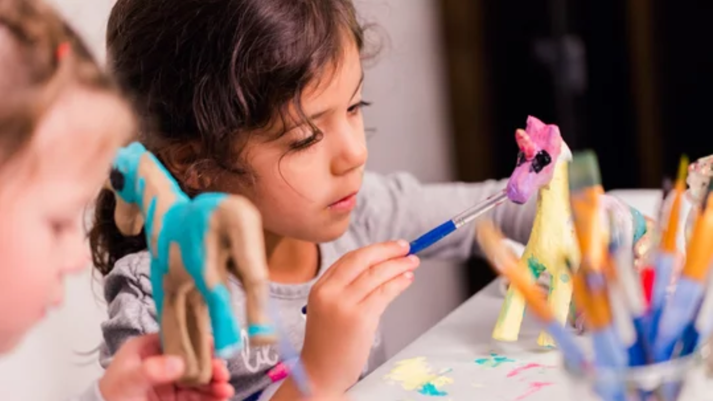 children painting at birthday party